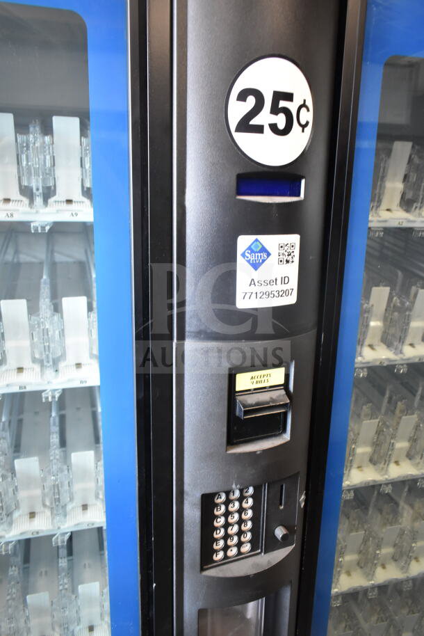 Crane 5800-4 vending machine with bill acceptor. Features keypad, 25¢ pricing label, 115V, 1 phase. Asset ID: 7712953207.