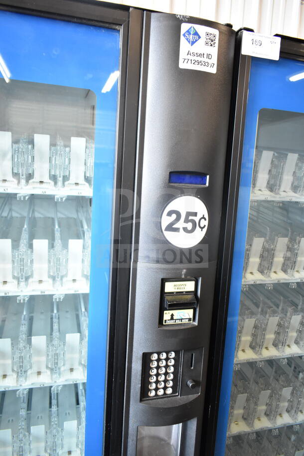 Crane 5800-4 commercial vending machine, 115V, with bill acceptor, asset ID 7712953317, blue and black exterior.