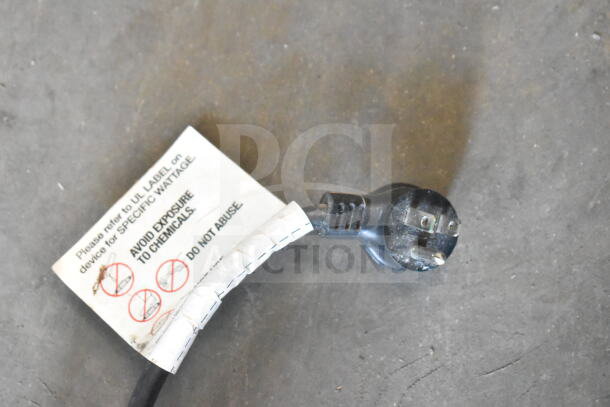 Power cord of Crane 5800-4 vending machine with visible caution label specifying usage and safety instructions.