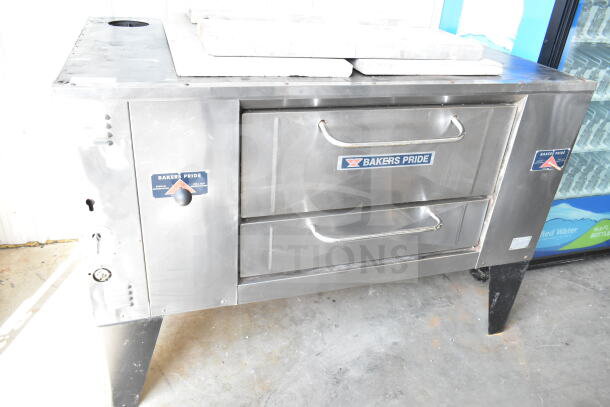 Bakers Pride D125 commercial pizza oven, natural gas, single deck, 125,000 BTU, metal legs, visible branding.