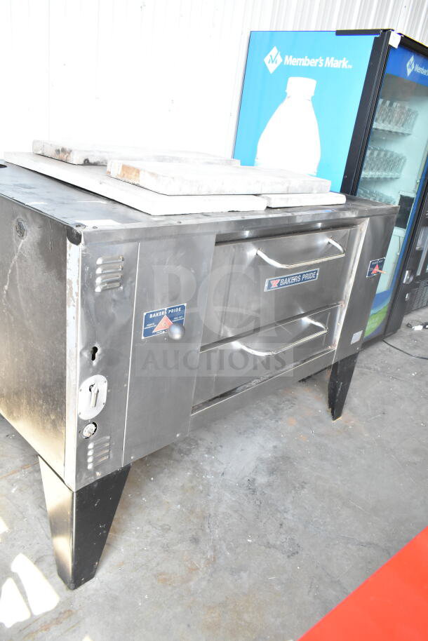Bakers Pride D125 commercial pizza oven on metal legs, natural gas powered, 125,000 BTU, stainless steel, used condition.