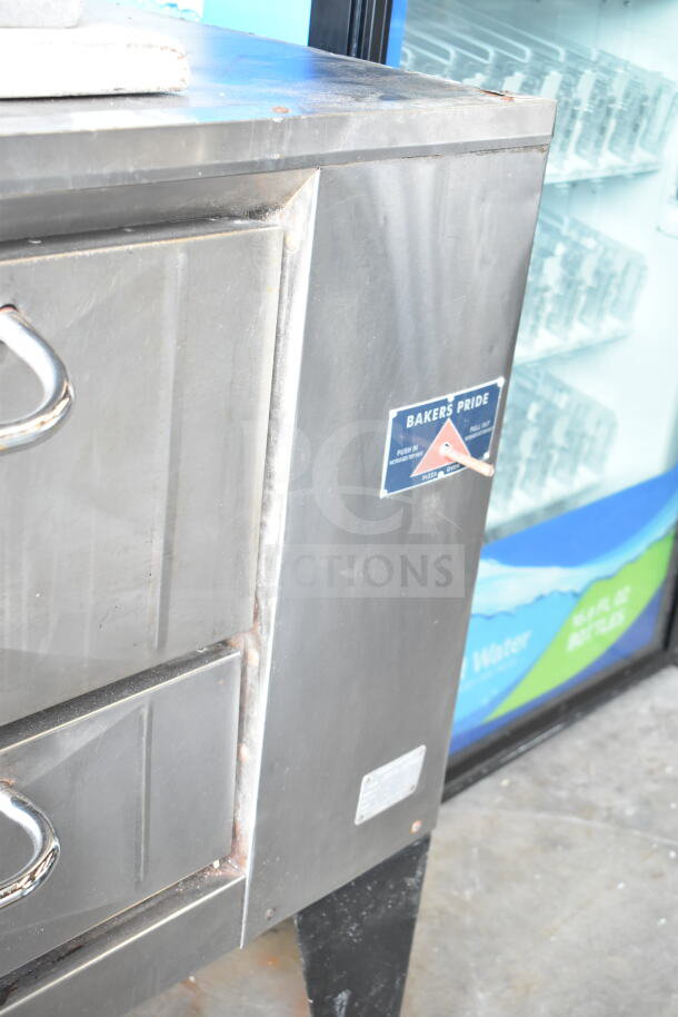 Bakers Pride D125 commercial pizza oven, natural gas, single deck, stainless steel, 125,000 BTU, on metal legs.
