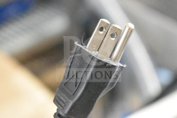 Close-up of power cord plug for Bunn VPR Commercial Coffee Machine, 120 Volts, 1 Phase. Black three-prong plug.