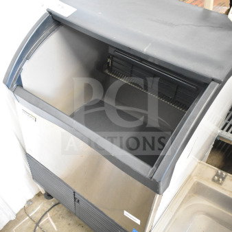 Scotsman Prodigy stainless steel undercounter ice machine, commercial-grade, self-contained, visible Prodigy label.