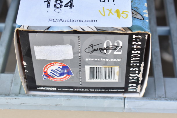 Box of Action Racing Collectables, 1:24 scale stock car, branded and labeled as authentic.