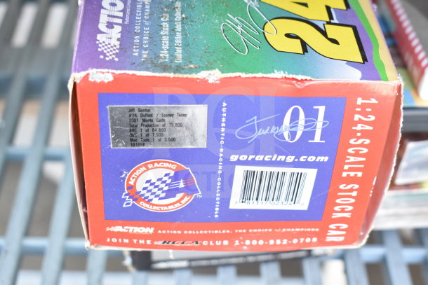 Box of DuPont 24 Stock Car, Jeff Gordon 2001 Monte Carlo. Includes production details and Action Racing branding.