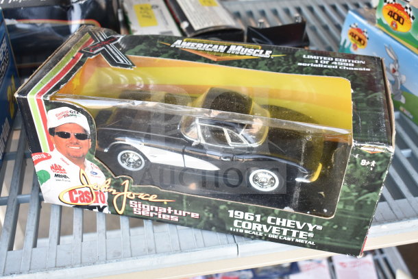 Boxed 1961 Chevy Corvette die-cast model by American Muscle, 1:18 scale, limited edition, part of John Force series.
