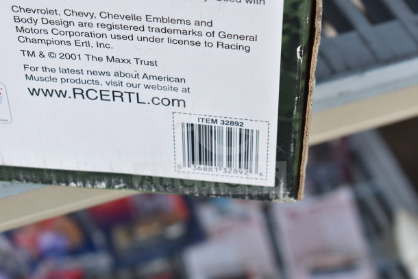 Box label showing item number 32892, featuring brands like Texaco, DuPont, and Mickey Mouse. 2001 Maxx Trust.