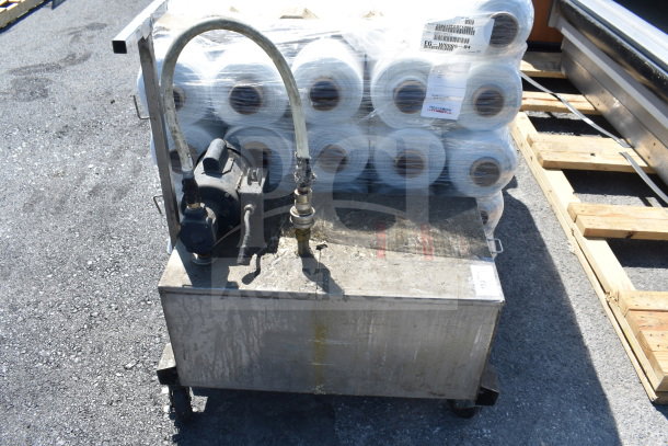 Frontline 402 Commercial Oil Caddy on casters, used condition, 120 Volts, 1 Phase, visible wear and oil residue.