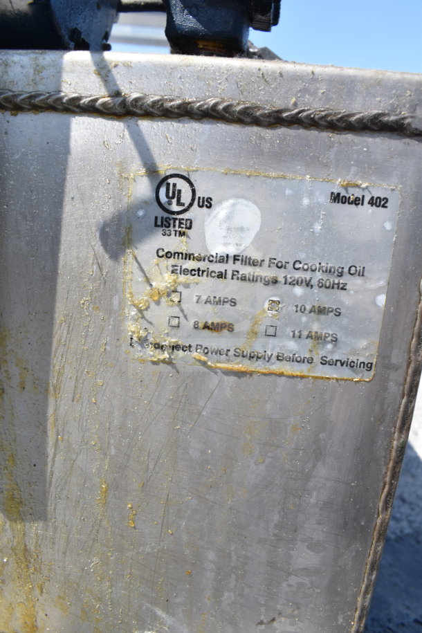 Frontline 402 Commercial Oil Caddy with visible UL listing, rated 120V, 60Hz, 8 amps. Used condition with worn surface.