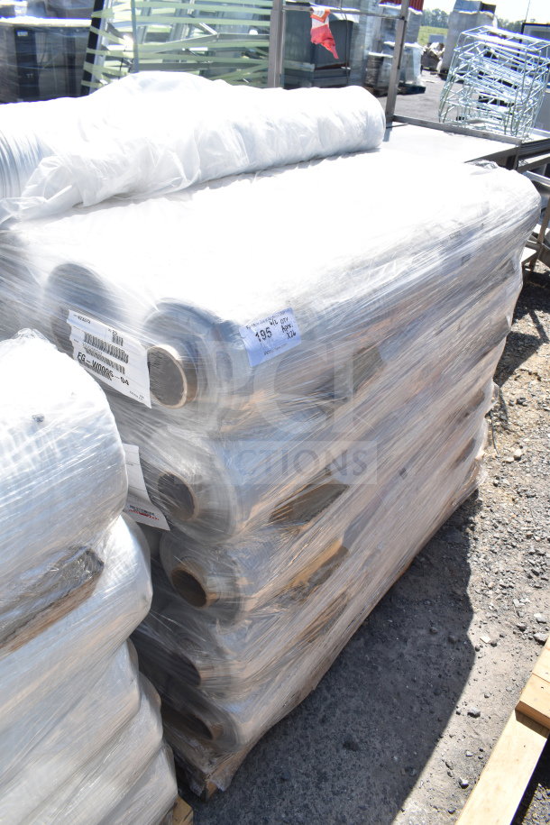 Stack of 26 FG-W0005-04 stretch film rolls on a pallet, labeled with product info and sealed in plastic wrap.