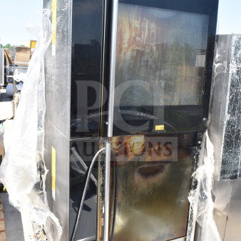 2 Fri-jado TDR7+7 P electric rotisserie ovens, 208V, 3 Phase, commercial use, visible wear, model labeled, outdoors.