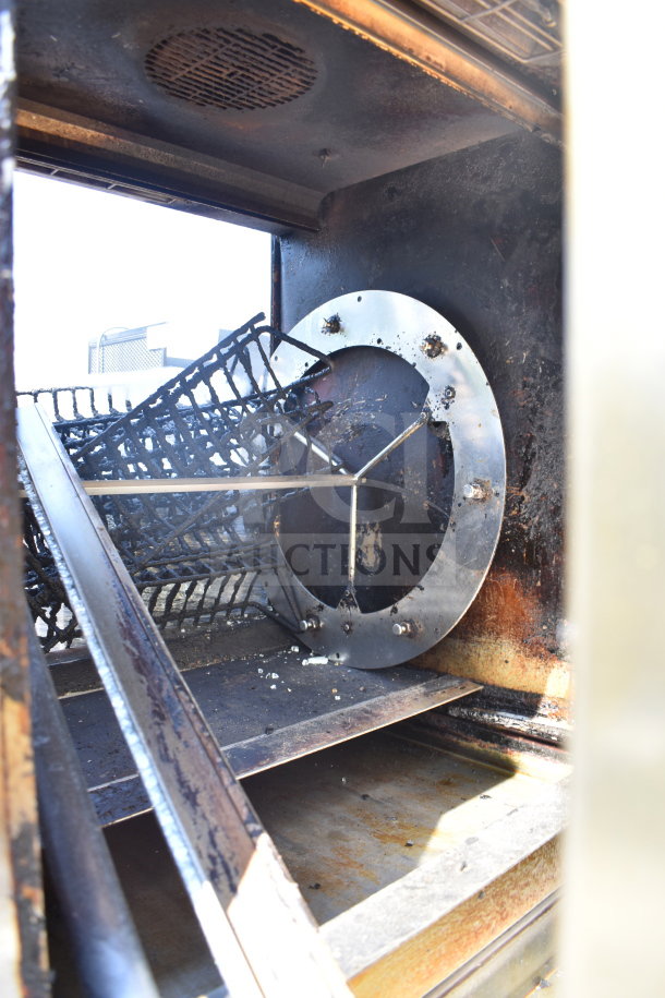 Fri-jado TDR7+7 P Commercial Electric Rotisserie Oven interior, showing cooking elements and trays, used condition.