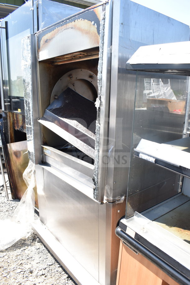 Commercial rotisserie oven, stainless steel, missing doors, visible wear and rust, suitable for parts or restoration.
