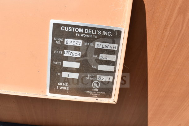 Custom Deli's Inc heated display case tag showing model DLW4H, 120/208V, single-phase. UL listed, date of manufacture: 8/11.
