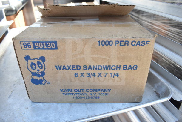 Commercial pan transport rack with trays and commercial casters, in used condition. Contains box of waxed sandwich bags.