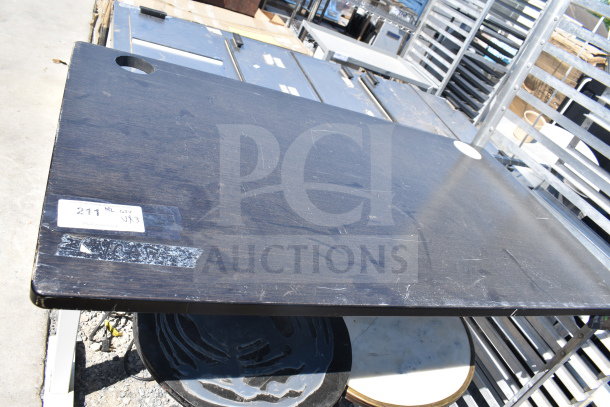 Three tables, including one rectangular and two round. Dark finish, some wear marks. Label marked "211" and "Qty 3."
