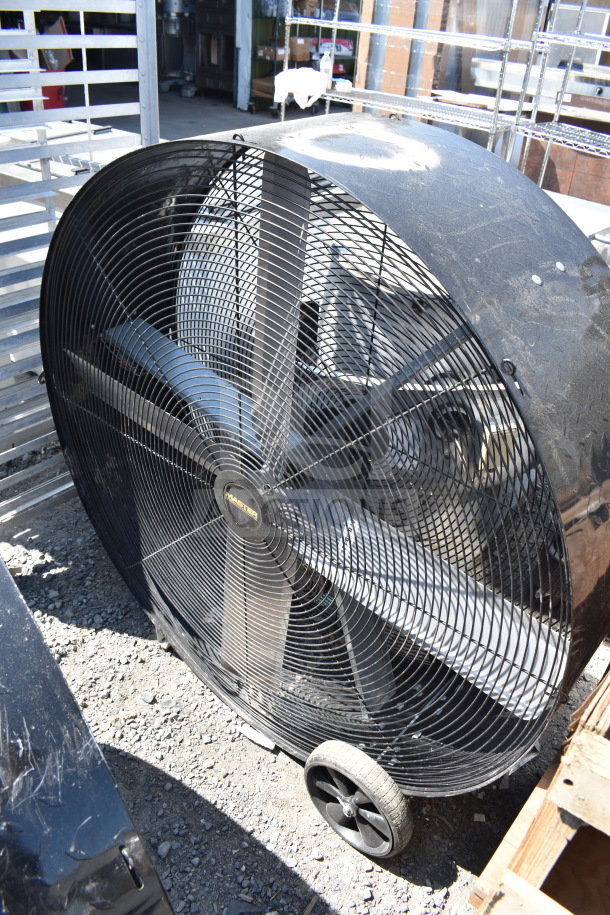 Large industrial fan, model MHD-36D-C, on wheels, black metallic frame, 120 volts, 1 phase, used condition.