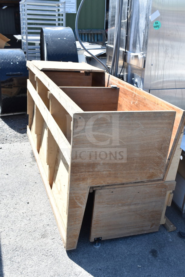 Wood pattern bench with a robust frame, unfinished surface. Visible joint construction. Moderate condition. No tags visible.