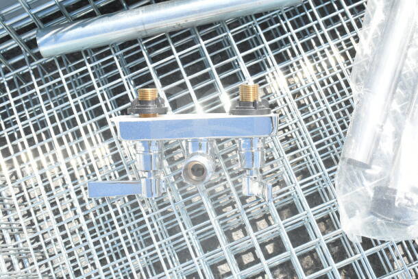 Chrome finish wire baskets with five compartments, new condition. Features polished chrome surface and durable wire construction.