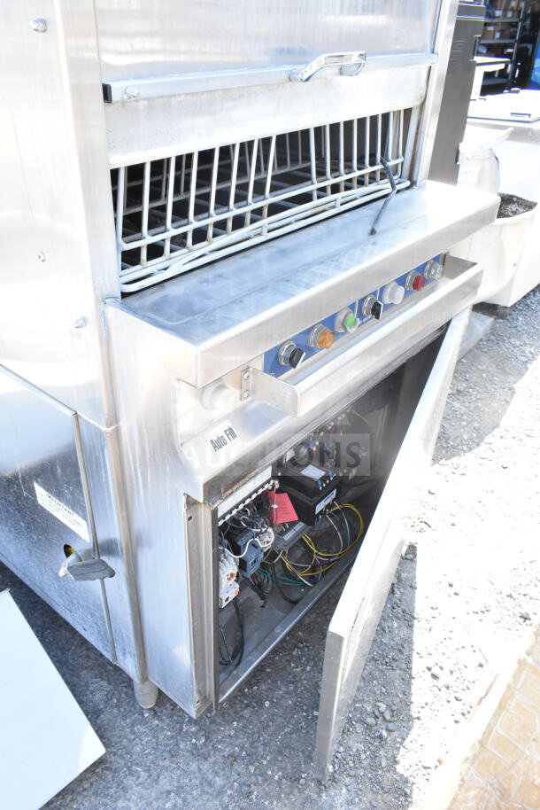 LVO FL14E stainless steel commercial front load pot and pan washer. Visible control panel and internal wiring. 460 volts, 3 phase.