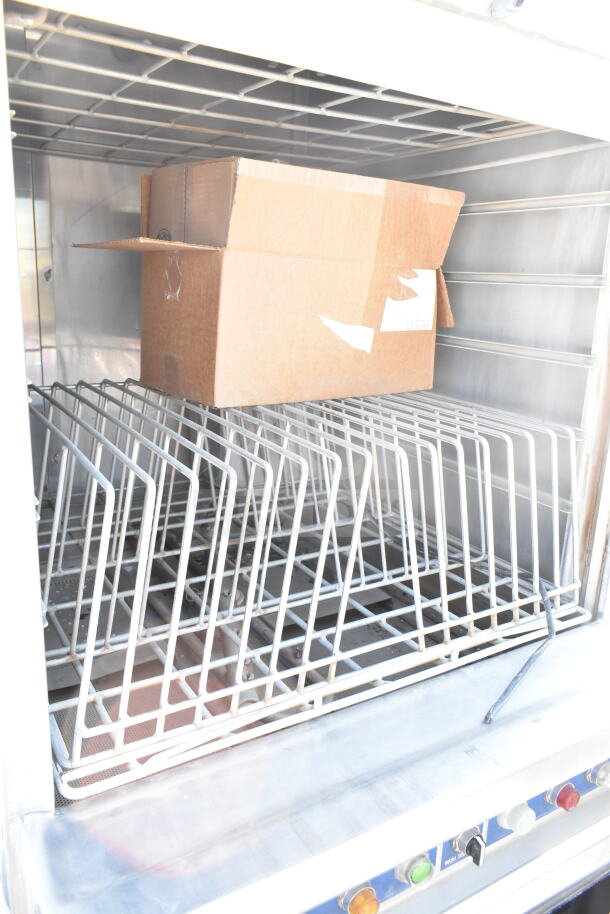 LVO FL14E stainless steel commercial front load pot and pan washer, 460 volts, 3-phase, showing interior racks.
