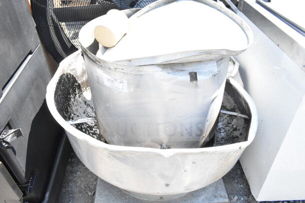 Commercial rooftop mushroom exhaust fan, made of metal, 115/208-230 volts, 1 phase, used condition, label indicates voltage.