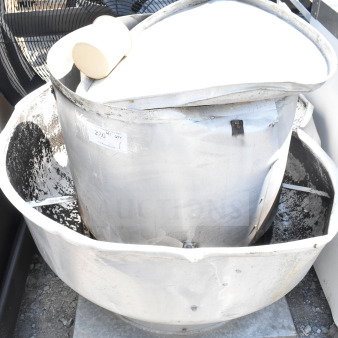 Commercial rooftop mushroom exhaust fan, made of metal, 115/208-230 volts, 1 phase, used condition, label indicates voltage.
