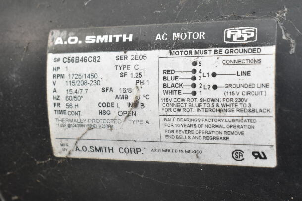 A.O. Smith AC motor label on commercial rooftop mushroom exhaust fan, 115/208-230V, 1 phase, key specifications and wiring guide visible.
