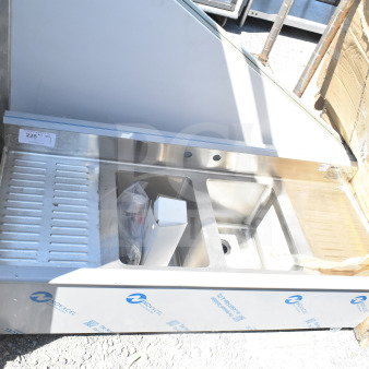 "New Eagle Group B4C-2-18 48x20 underbar sink with two compartments, drainboards, and splash-mount faucet. Scratch and dent."