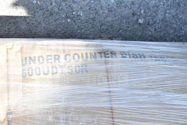 Plastic-wrapped package labeled "UNDER COUNTER DISH TABLE" with model "600UDT50R" visible. Appears as new condition.