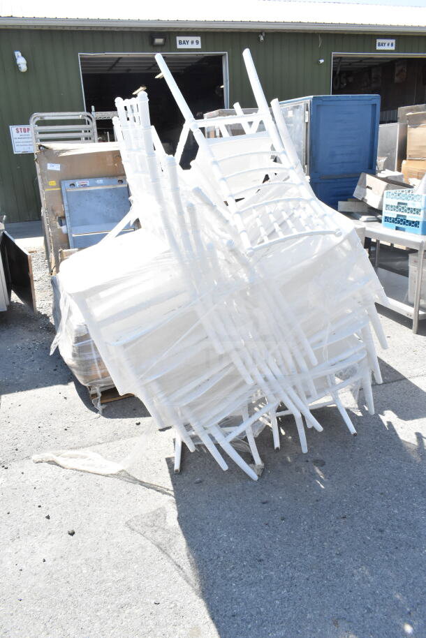 19 new Lancaster Table & Seating 164chiavwhte white Chiavari chairs, scratch and dent condition, wrapped in plastic.