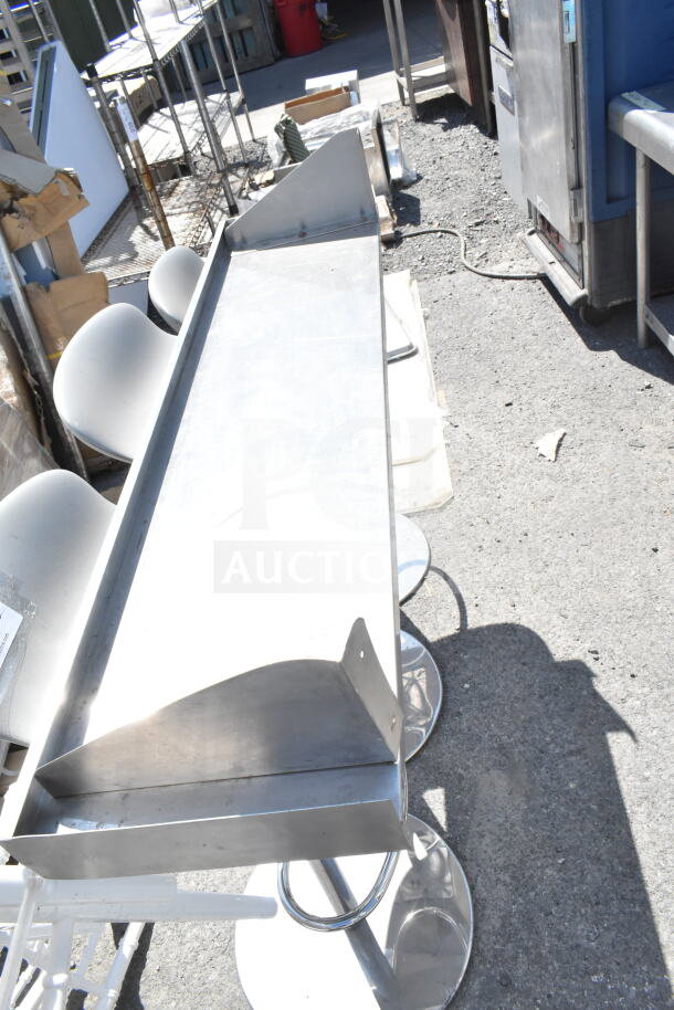 Stainless steel shelf, industrial style, shows slight wear. Ideal for garages or workshops. Includes two units per bid.