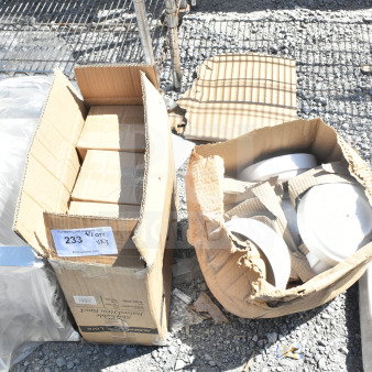 Cardboard boxes containing 303SCD16WH stackable raised rim bowls. Boxes show signs of wear. Auction label visible.