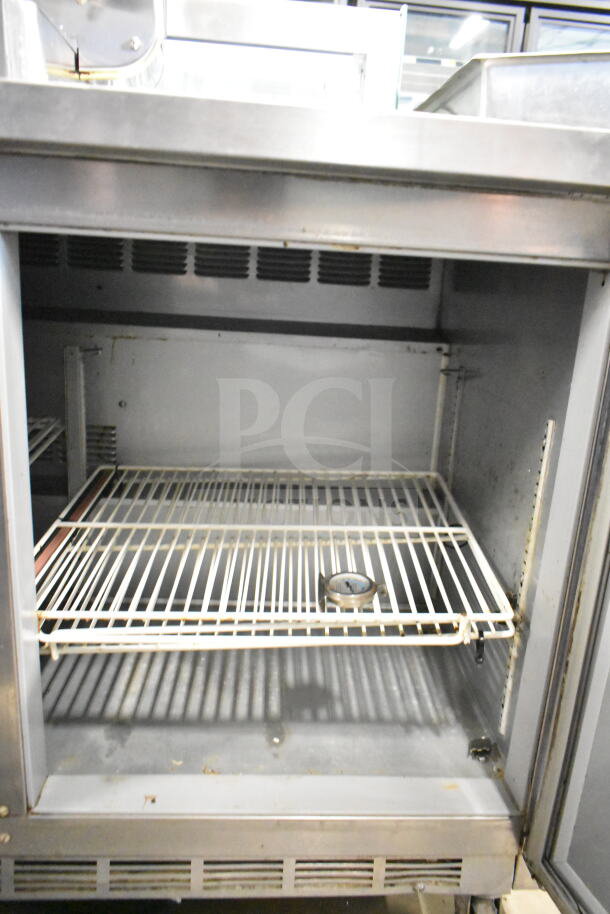 Beverage Air WTR72AY commercial 3-door undercounter cooler, 115V, 1 phase. Features wire shelving and interior fan vents.
