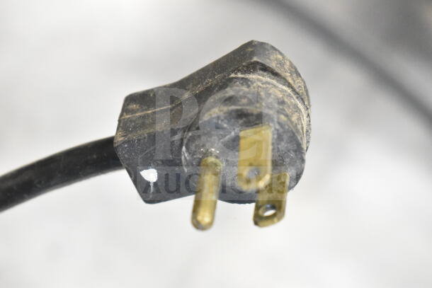 Beverage Air WTR72AY commercial 3-door undercounter cooler plug, 115 volts, showing wear.
