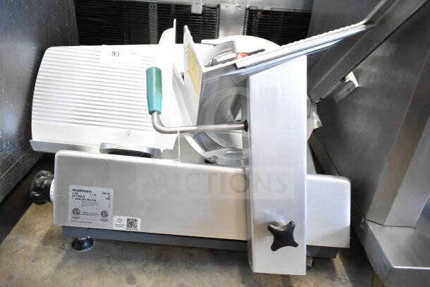 2018 Bizerba GSP HD meat slicer, stainless steel, green handle, 120V, 1 phase, commercial-grade, model label visible.