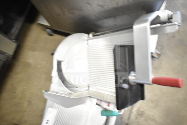2018 Bizerba GSP HD commercial meat slicer, countertop model. Features include manual controls, stainless steel blades, 120V, 1 Phase.