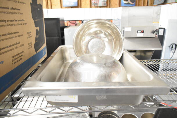 Two metal bowls inside a stainless steel drop-in bin on a wire shelf. Auction tag visible. 3 times your bid!