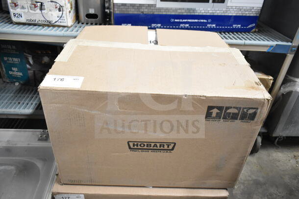 Cardboard box labeled "Hobart" containing a 2020 Hobart HTi-7LH4W Commercial Food Portioning Scale. Note screen damage.