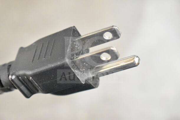 Close-up of the power plug for a Hobart HTi-7LH4W commercial food scale. Plug is undamaged, suitable for 120/208-240 volts.