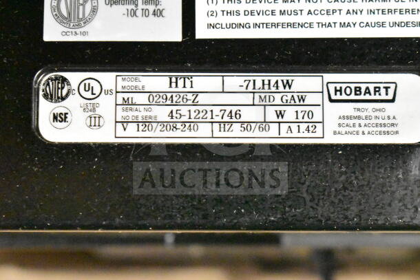 2020 Hobart HTi-7LH4W commercial food scale label, showing model, voltage specs, and NSF certification.