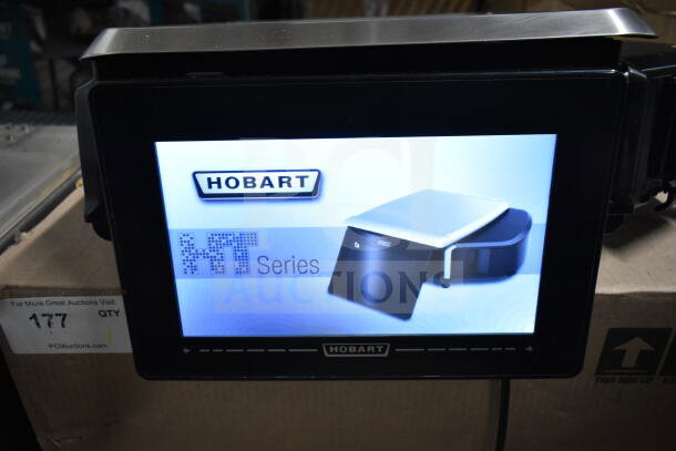 2017 Hobart HTi-7LH26 food portioning scale, tested and working. Visible screen damage. 120/208-240V, 1 phase.