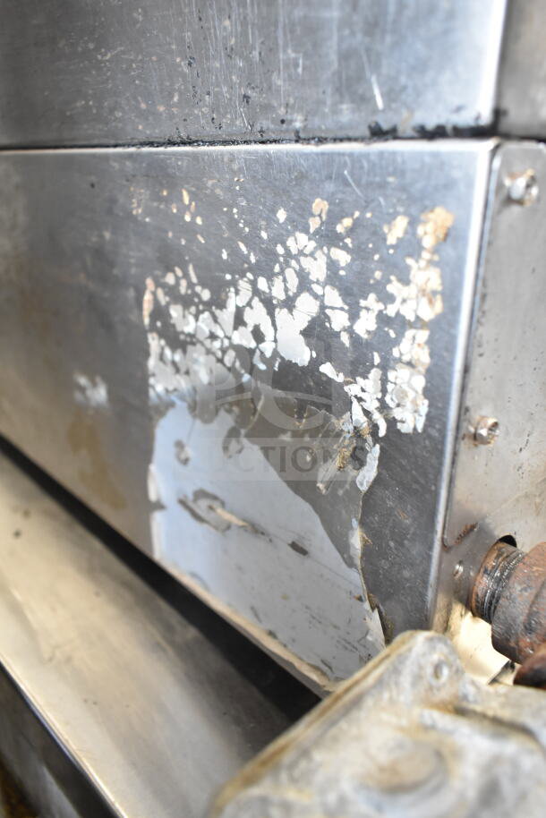 Cecilware Pro countertop gas charbroiler grill with visible wear and peeling paint on metal surface, indicating used condition.