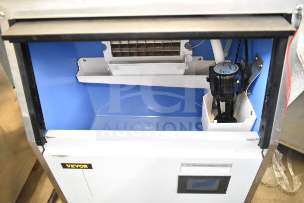 2023 Vevor P70-408.V1s commercial ice machine, 110 volts, 1 phase; features internal components and Vevor branding.