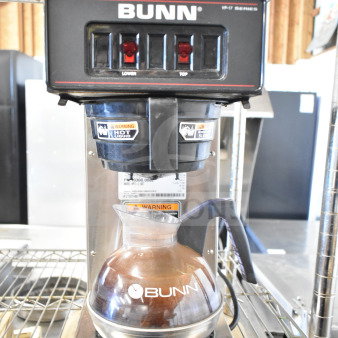 BRAND NEW SCRATCH AND DENT 2018 Bunn 13300.0002 VP17-2 SS Pourover Coffee Brewer, 2 Warmers, 120V, with warning labels visible.