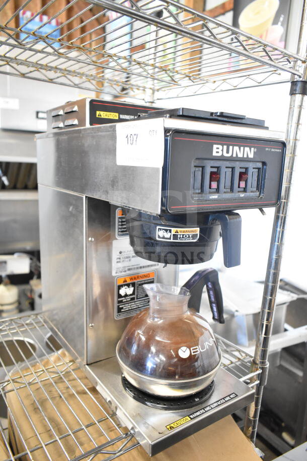 Brand new 2018 Bunn VP17-2 SS coffee brewer, low profile, scratch and dent, with 2 warmers, 120V, 1 Phase. Warning labels visible.