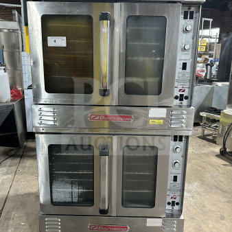 Southbend commercial stainless steel gas-powered double-stacked convection oven with thermostatic control, oven racks, and legs.