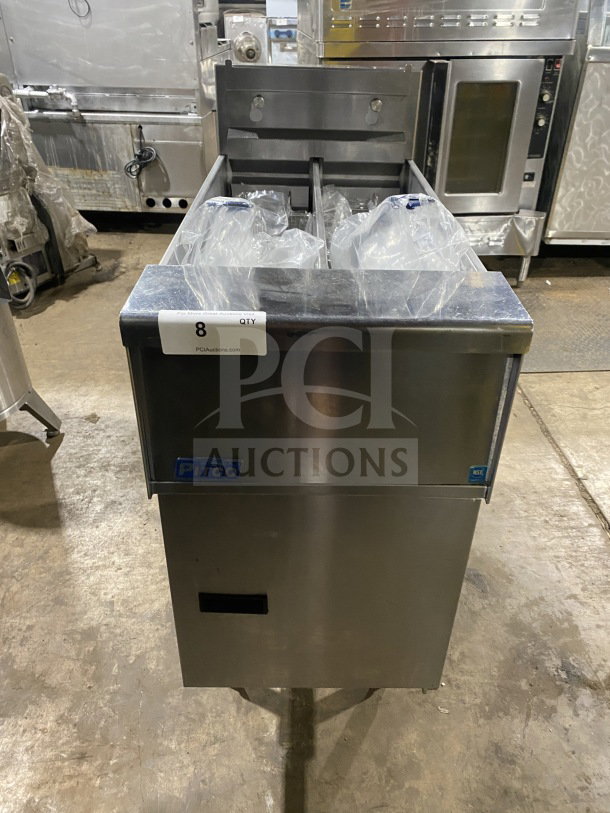 Pitco SE14T commercial stainless steel deep fat fryer with back splash, basket hanger, new fry basket, on legs.