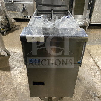 Pitco SE14T commercial stainless steel deep fat fryer with back splash, basket hanger, new fry basket, on legs.